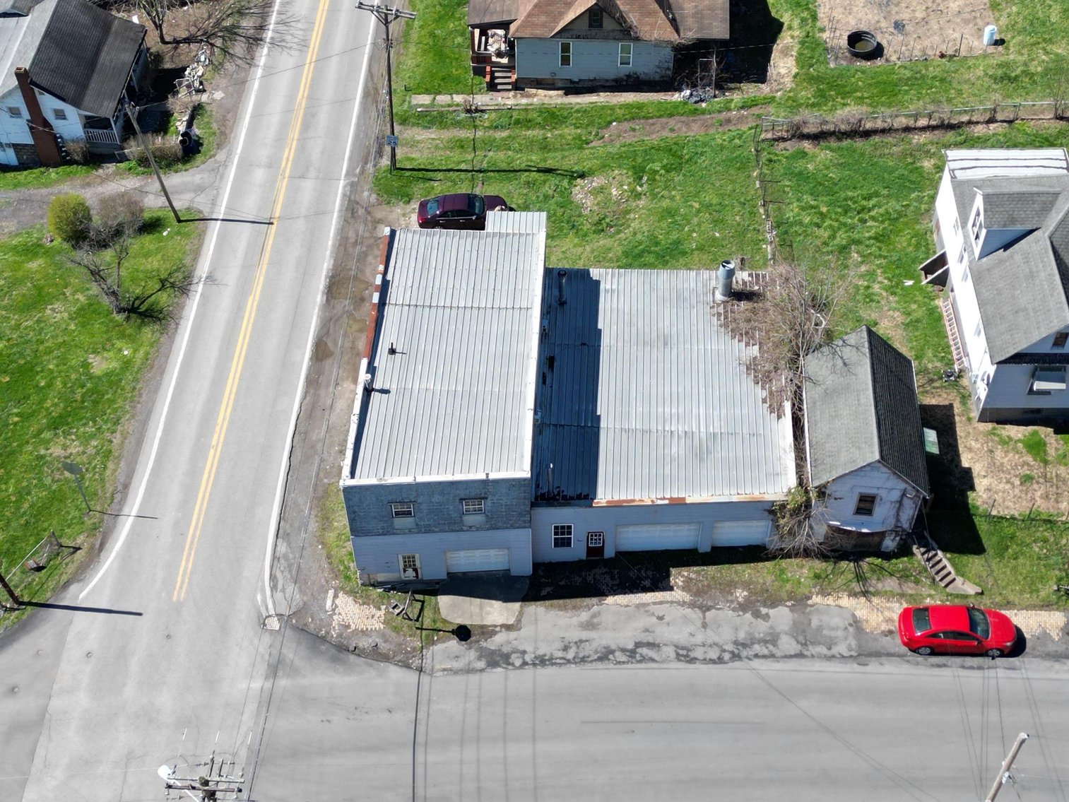 Image for SOLD $63,800 - Commercial Building with Garage Bays & Apartment Selling to the Highest Bidder