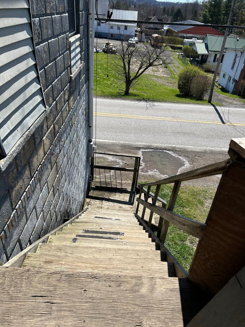 Image for SOLD $63,800 - Commercial Building with Garage Bays & Apartment Selling to the Highest Bidder