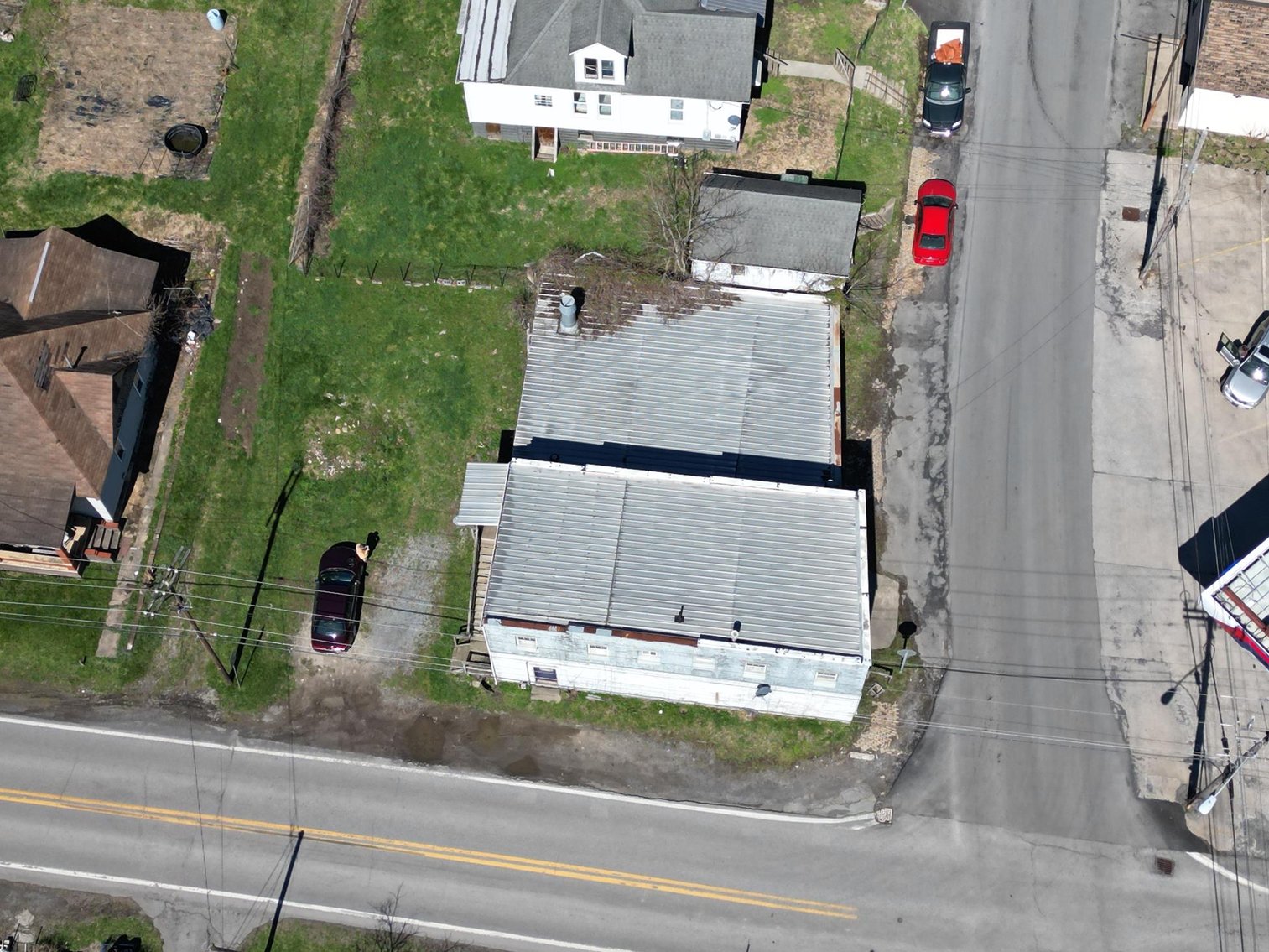 Image for SOLD $63,800 - Commercial Building with Garage Bays & Apartment Selling to the Highest Bidder