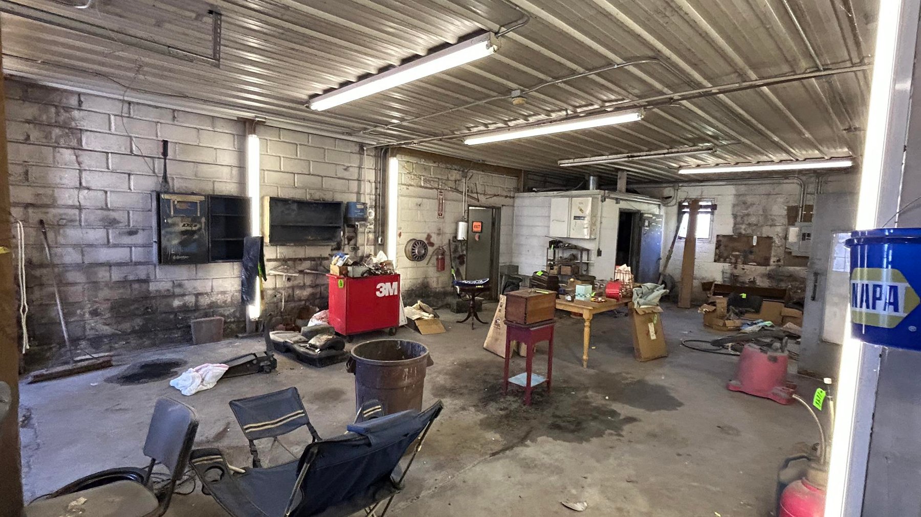 Image for SOLD $63,800 - Commercial Building with Garage Bays & Apartment Selling to the Highest Bidder