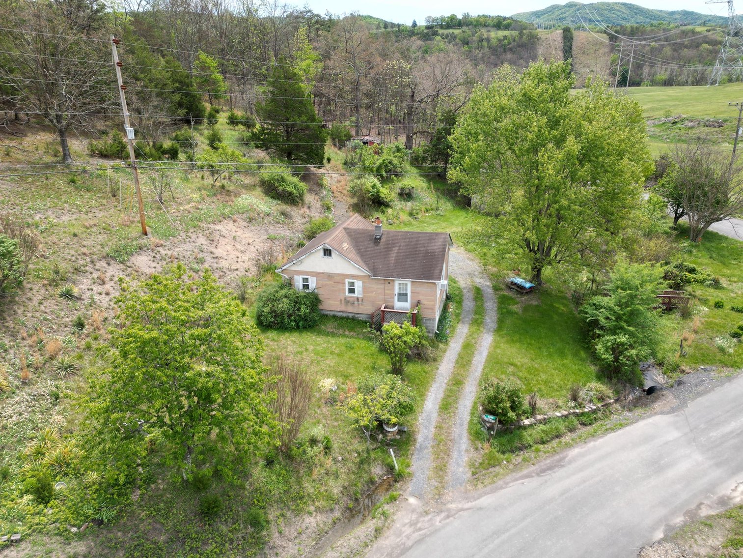 Image for Rustic Mountain Cottage on Nearly 2.5 Acres in Petersburg Selling to the Highest Bidder