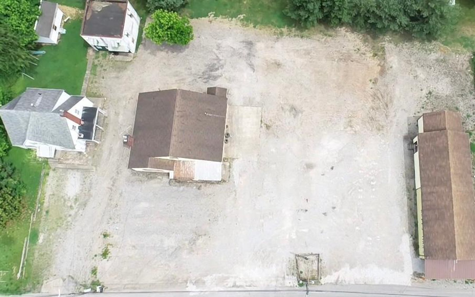 Image for SOLD $192,500 - Commercial Building and Residential Units Selling to the Highest Bidders