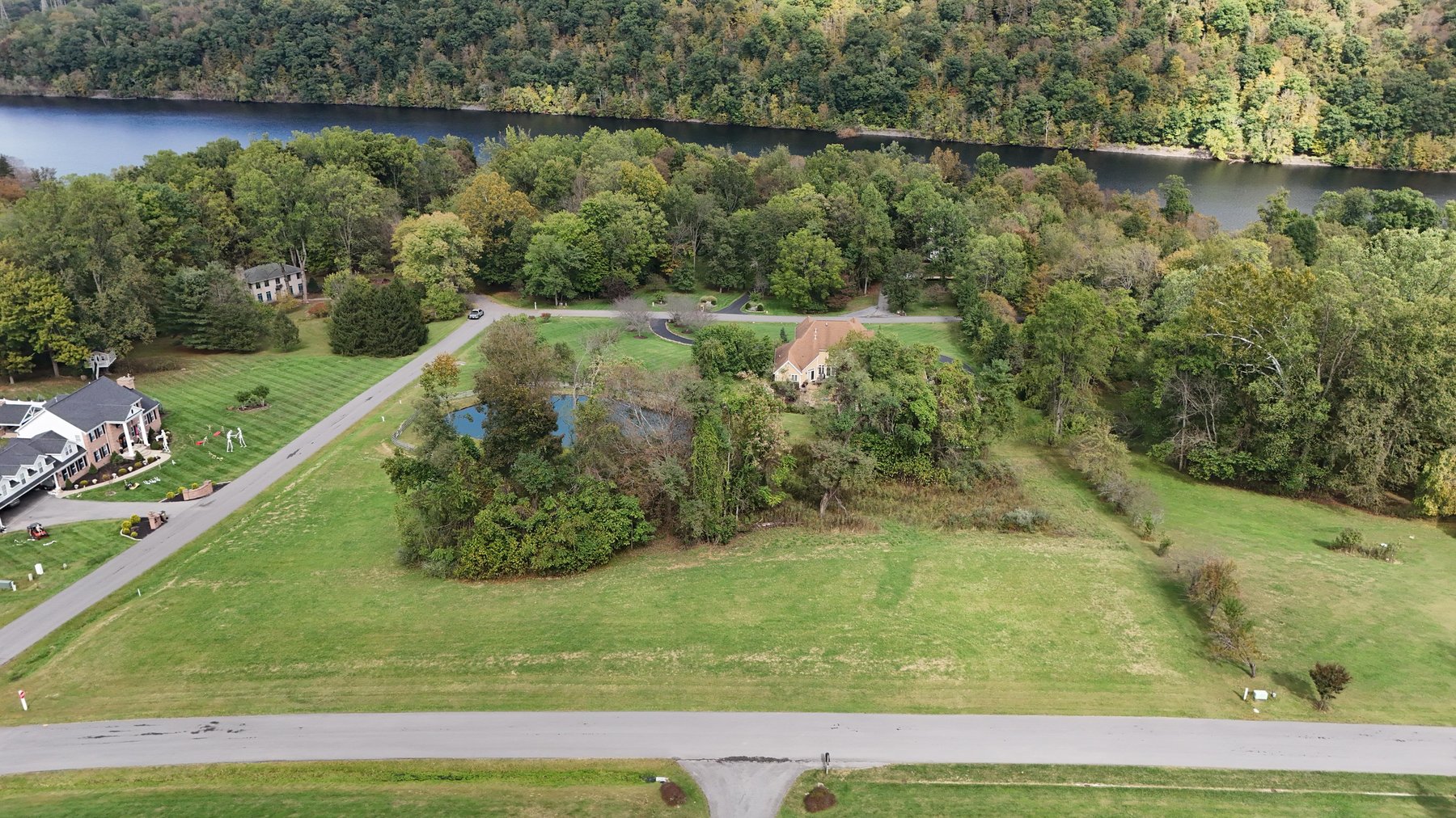 Image for SOLD $176,000 - 2 Acre Corner Lot in The Woodlands Neighborhood of Cheat Lake