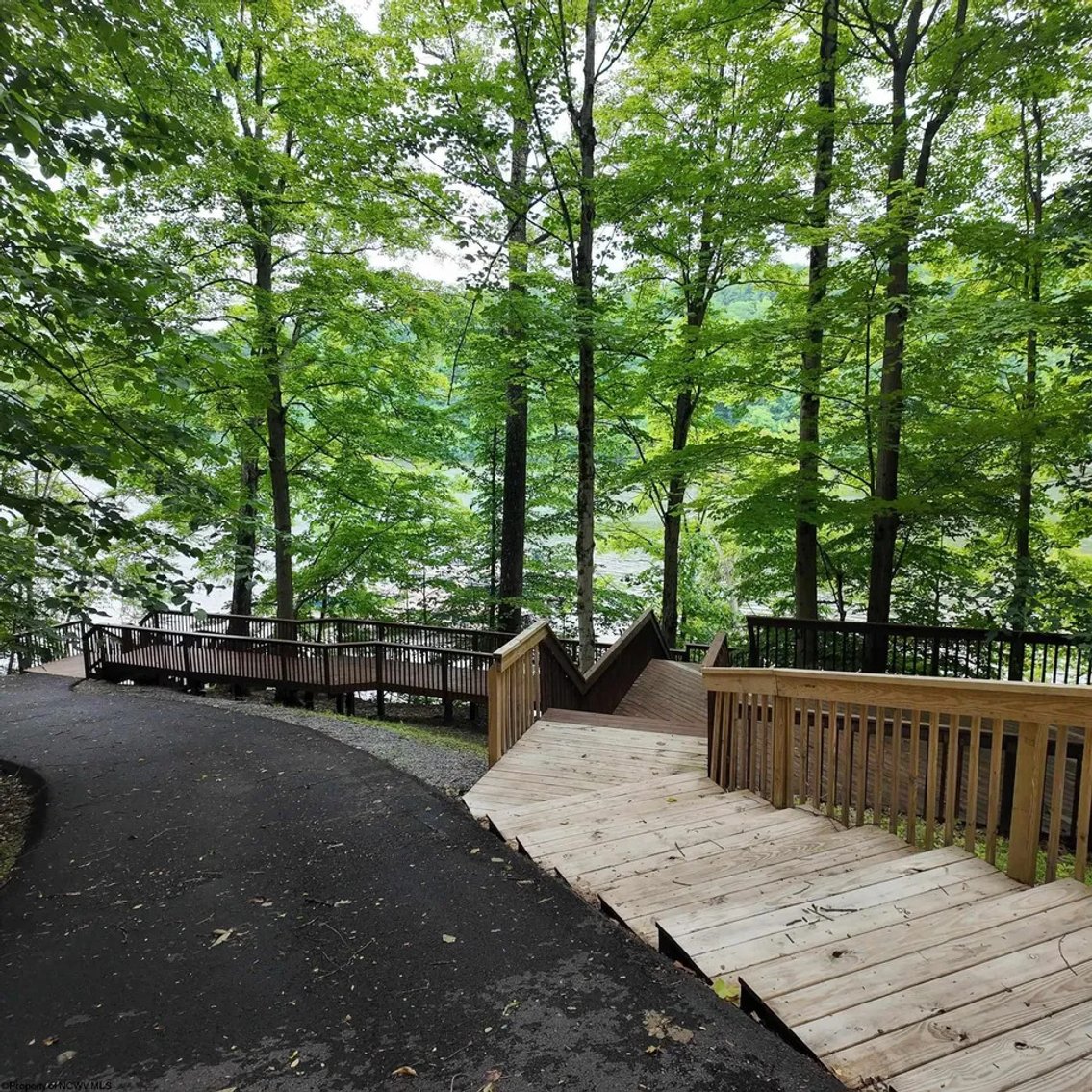 Image for SOLD $176,000 - 2 Acre Corner Lot in The Woodlands Neighborhood of Cheat Lake