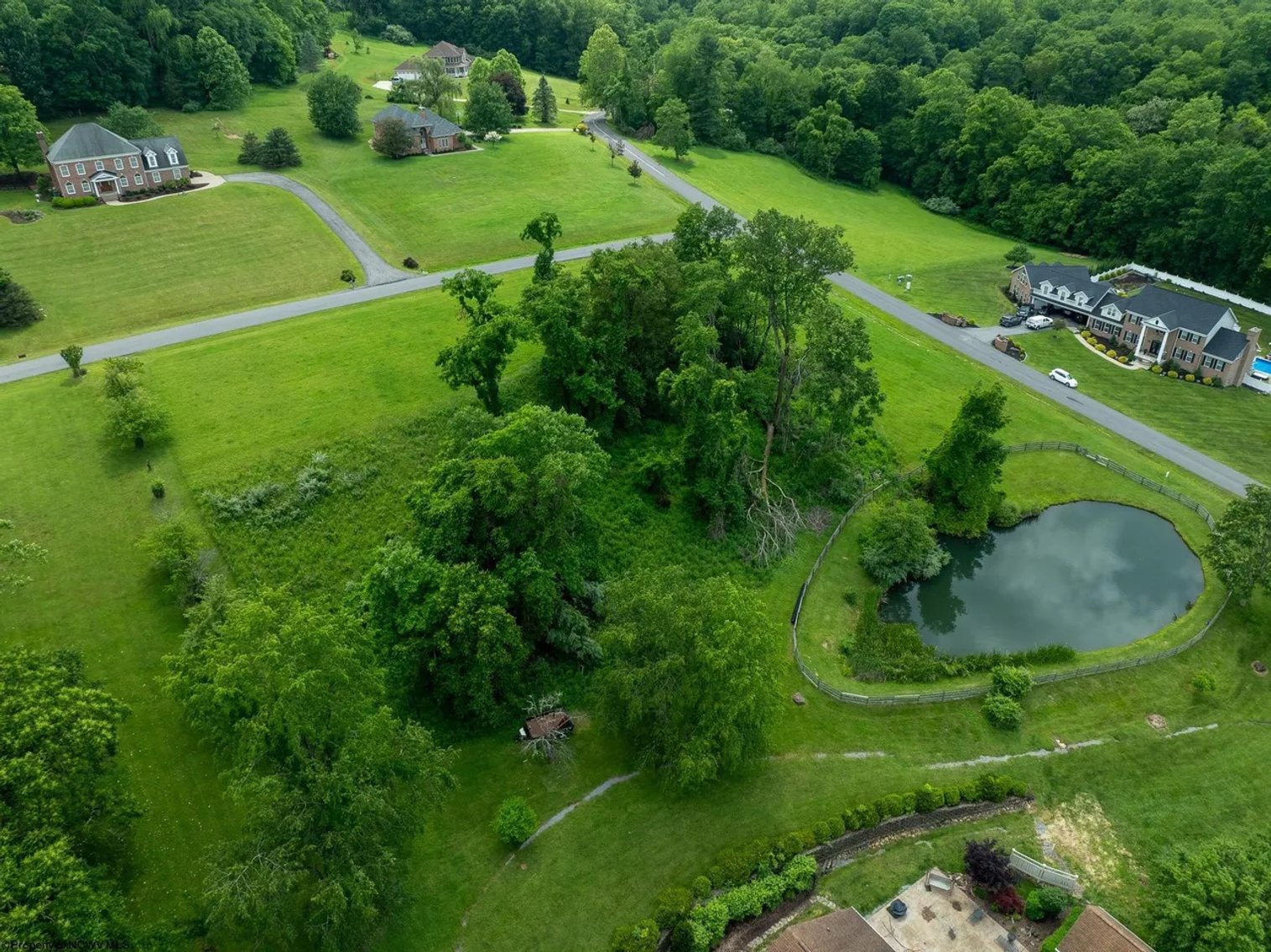Image for SOLD $176,000 - 2 Acre Corner Lot in The Woodlands Neighborhood of Cheat Lake
