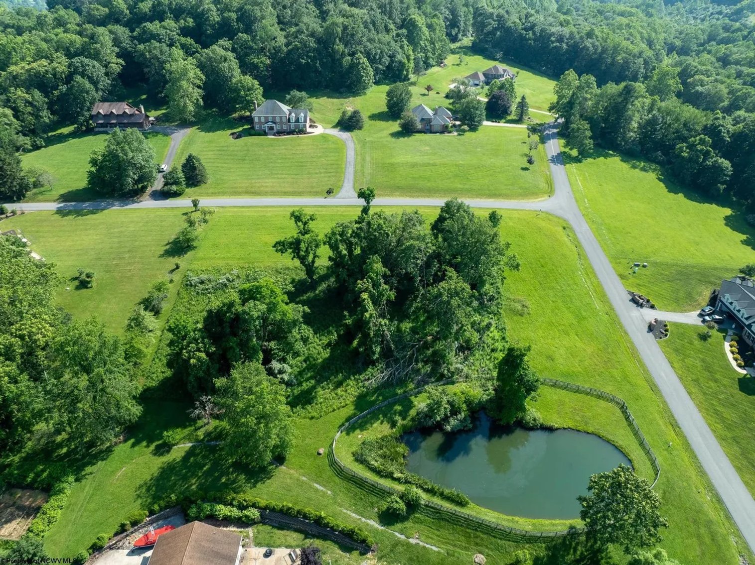 Image for SOLD $176,000 - 2 Acre Corner Lot in The Woodlands Neighborhood of Cheat Lake