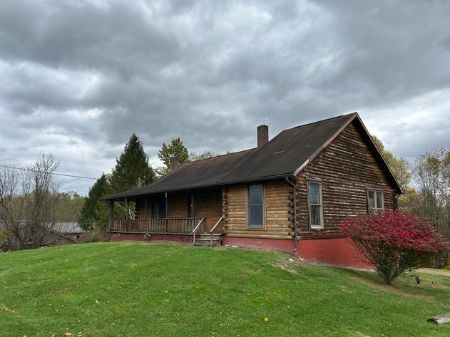 Image for SOLD $101,200 - Log Home on Over Half an Acre in Kingwood