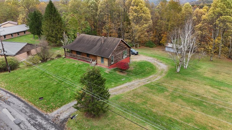Image for SOLD $101,200 - Log Home on Over Half an Acre in Kingwood