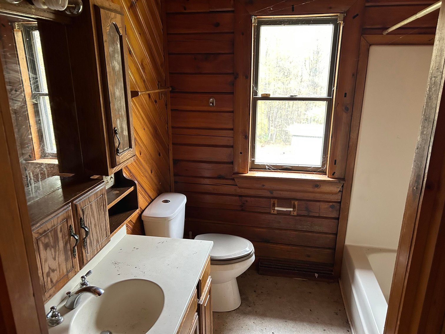 Image for SOLD $101,200 - Log Home on Over Half an Acre in Kingwood