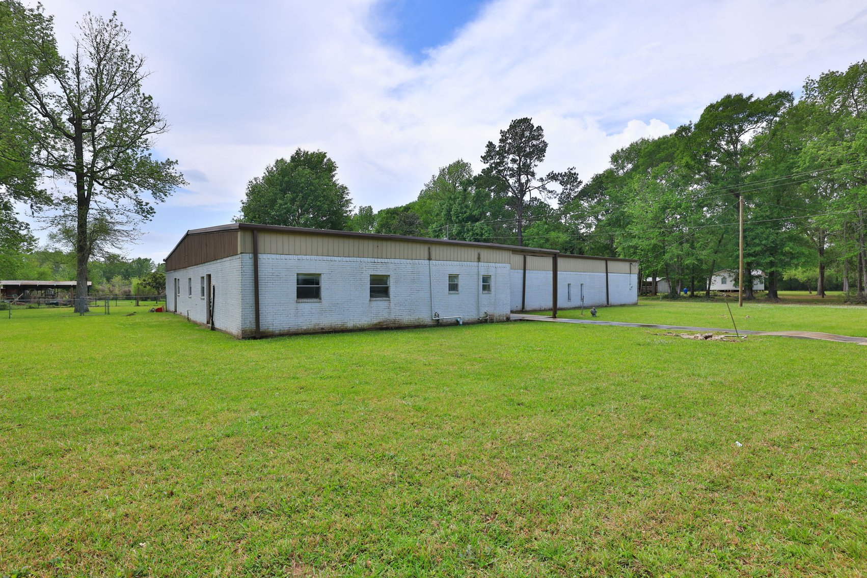 Image for Commercial Property Auction – 29 County Rd 2295, Cleveland, TX 77327