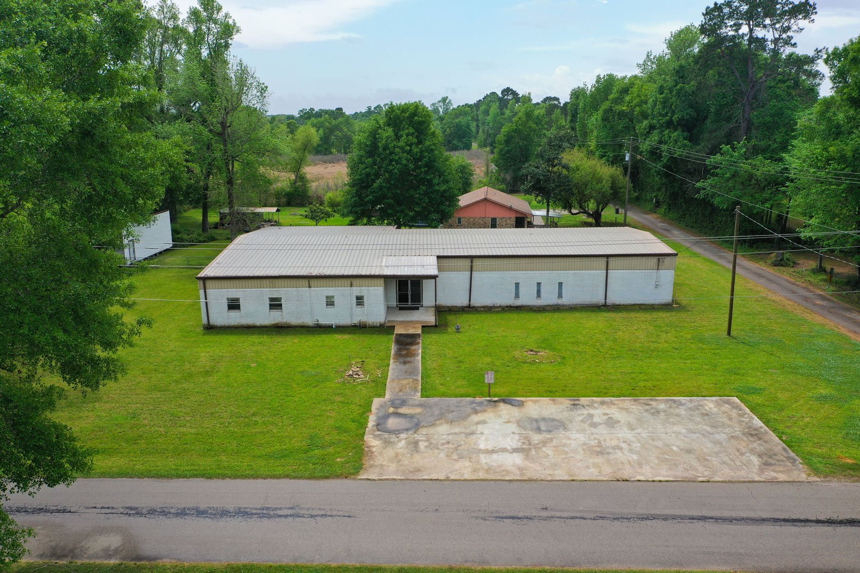 Image for Commercial Property Auction – 29 County Rd 2295, Cleveland, TX 77327