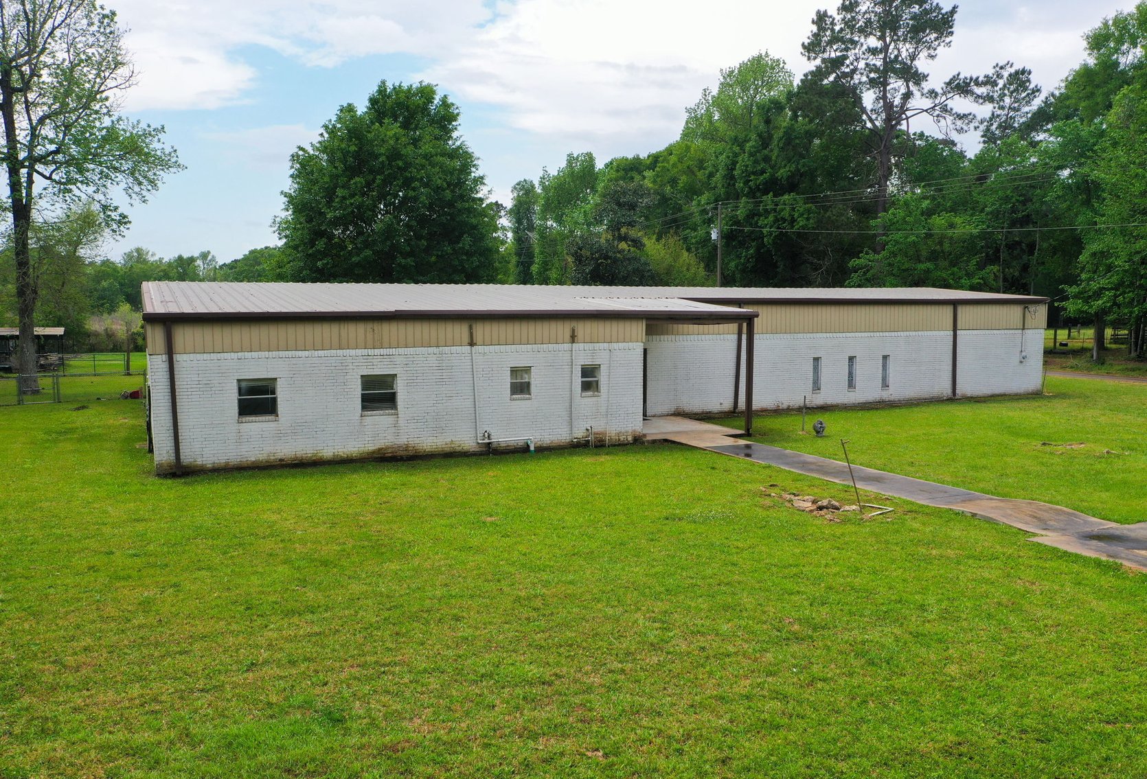 Image for Commercial Property Auction – 29 County Rd 2295, Cleveland, TX 77327