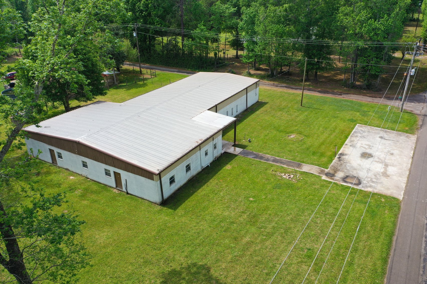 Image for Commercial Property Auction – 29 County Rd 2295, Cleveland, TX 77327
