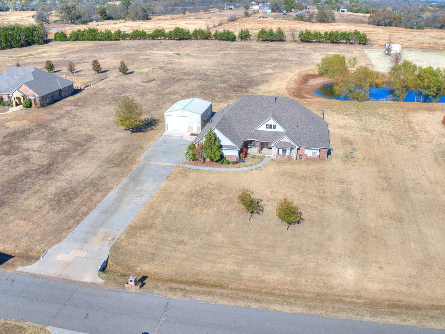 Image for 5861 Whispering Lakes Dr, Noble, OK - Beautiful Home, Shop, & Acreage