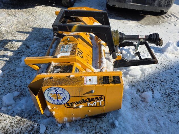 Trackless Front Flair Mower Attachment