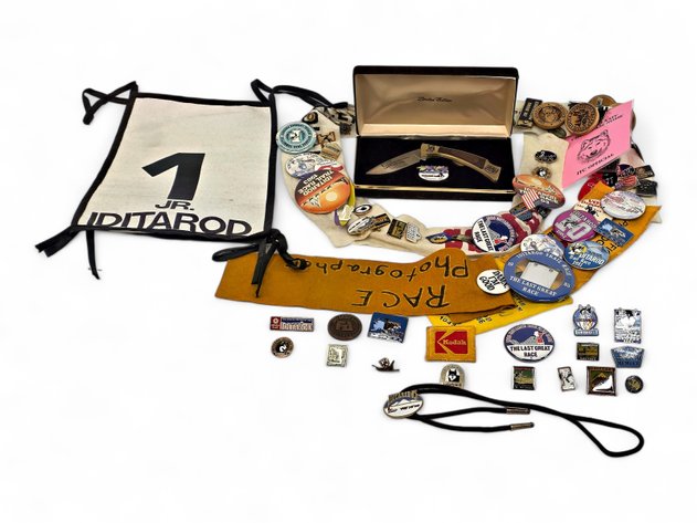 1987 Iditarod Browning Folding Knife, Junior Iditarod Bib, 1985 Bolo Tie & More