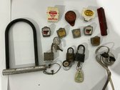Fourteen Piece Vintage Advertising Memorabilia And Security Hardware Lot