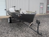 Traveler Aluminum Boat w/Johnson Outboard Motor And Trailer
