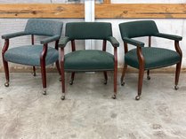 Three Upholstered Caster Armchairs