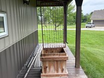 Upcycled Wood Planter With Spring Trellis