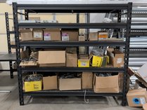 Industrial Shelves Loaded With Electrical Supplies