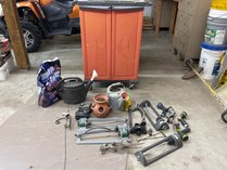 Garden Storage Cabinet And Watering Tools