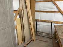 Assorted Lumber, Panels And Clothing Racks