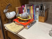 Assorted Cookbooks And Kitchenware