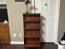 Wooden Bookshelf And Gooseneck Desk Lamp