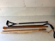 Four Walking Sticks And Canes
