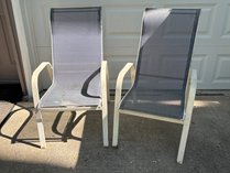Two Metal And Mesh Patio Chairs