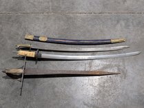 Assorted Swords And Scabbard