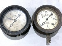 Two Antique Steam And Altitude Gauges