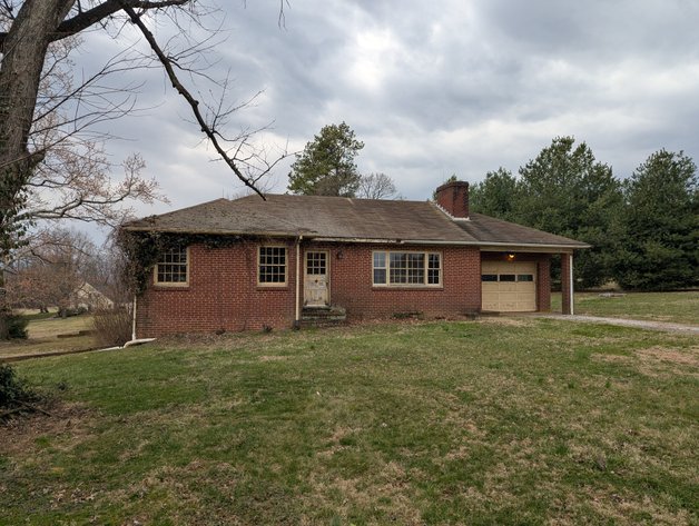 3 BR, 2 BATH BRICK RANCHER W/ ATT. 1-CAR GARAGE & STORAGE SHED 2.0 +/- AC LOT