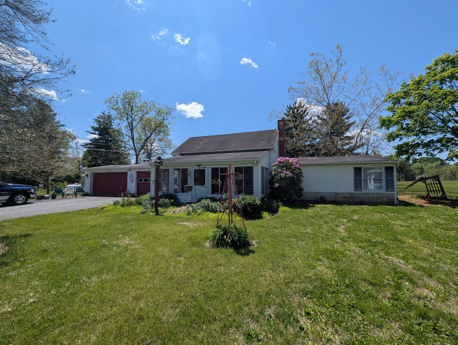 Image for BUNGALOW/RANCHER STYLE HOME W/ ATT. 2-CAR GARAGE & DET. 25'X12' STORAGE BLDG. 2.85 +/- AC IN (2) PARCELS/ 04' DODGE RAM, 01' PT CRUISER, KUBOTA TRACTOR, COLLECTIBLES, CHINA, HOUSEHOLD GOODS, & MORE!