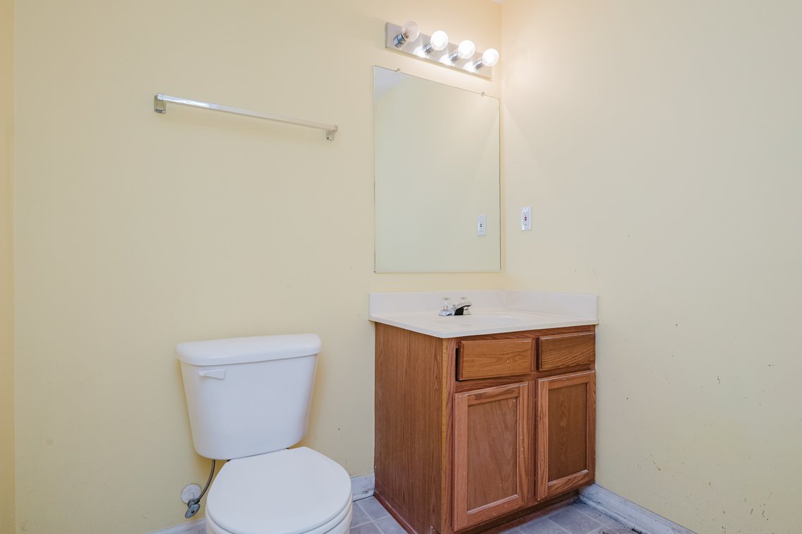 Image for ATTN: FIRST TIMERS, INVESTORS, & RENOVATORS! 2 BR, 4 BATH BRICK & VINYL CENTER UNIT TOWNHOME/ PRIVATE EOC LOCATION & PRIVATE BACK YARD