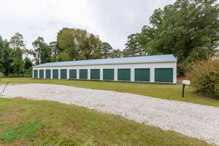 Image for Finance Friendly and Income Producing Auction. Beautifully Renovated 4 bed/ 2 Bath, 2282 Sq.ft  Country Estate with Converted Barns for Outdoor Entertaining & 24 Storage Units