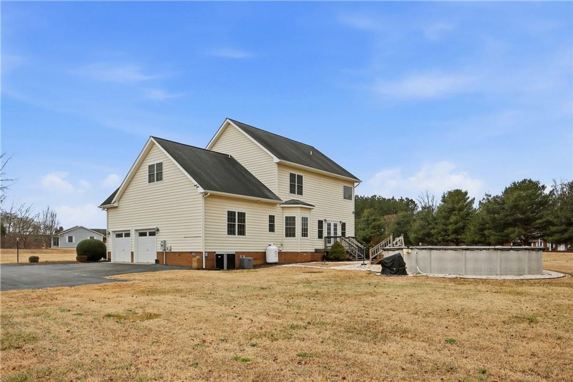 Image for THE MEADOW VIEW ESTATE AUCTION Stately Colonial Home on 1.39± Acres with Wraparound Porch, Pool & 2-Car Garage Tappahannock, Virginia