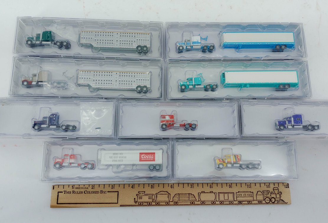 9 N GAUGE PETERBILT & KENWORTH SEMI TRUCKS & TRAILERS INCL COORS, 9 OBS  INV 263331584