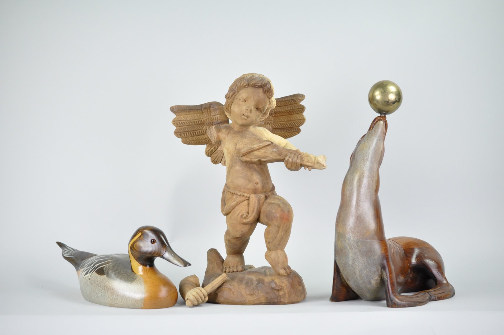 Seal, Cherub, and Signed Duck Decoy Wood Sculptures