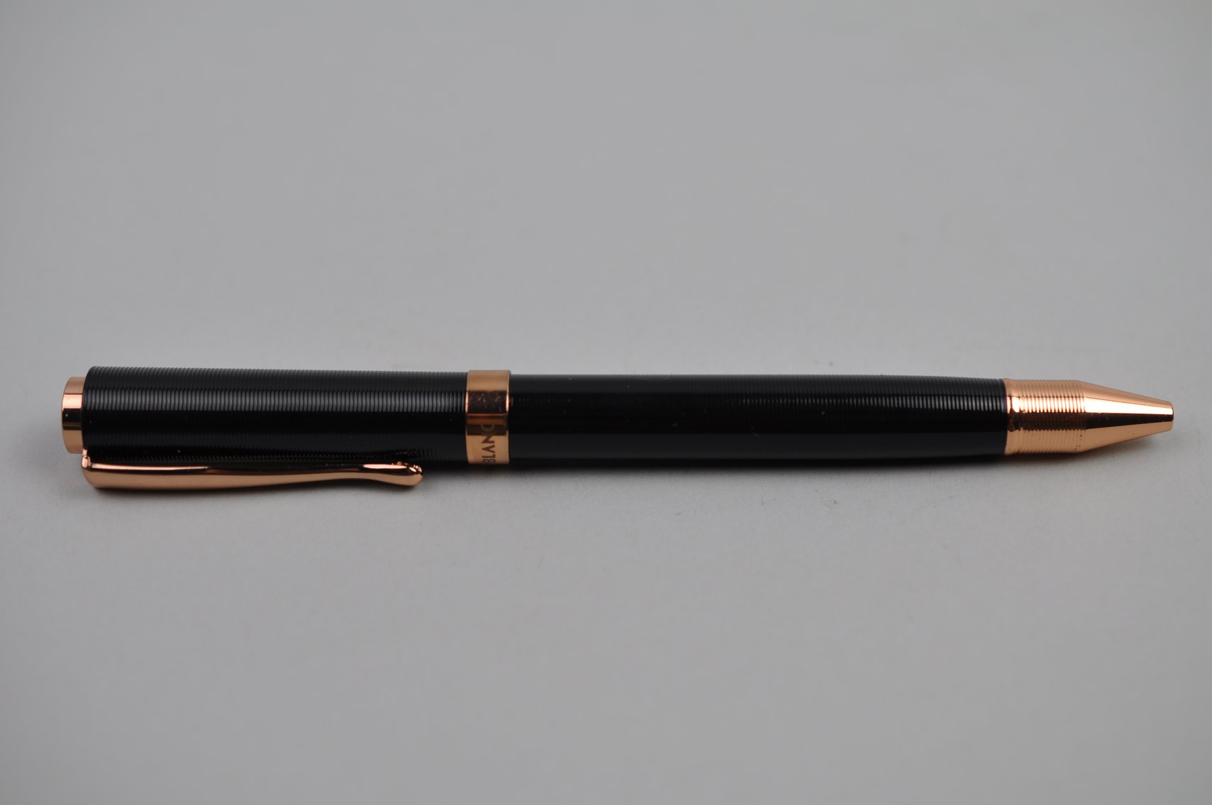 Black and Rose Ballpoint Pen