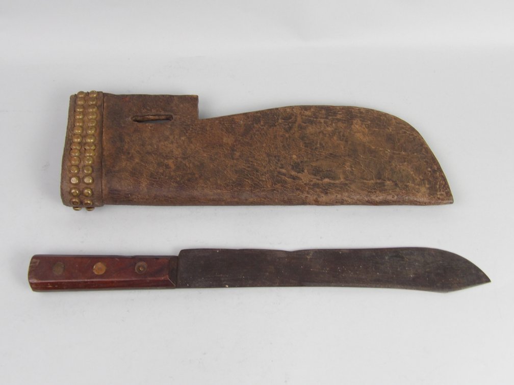 Attributed Blackfoot / Northern Plains Trade Knife with Brass Tacked Leather Sheath