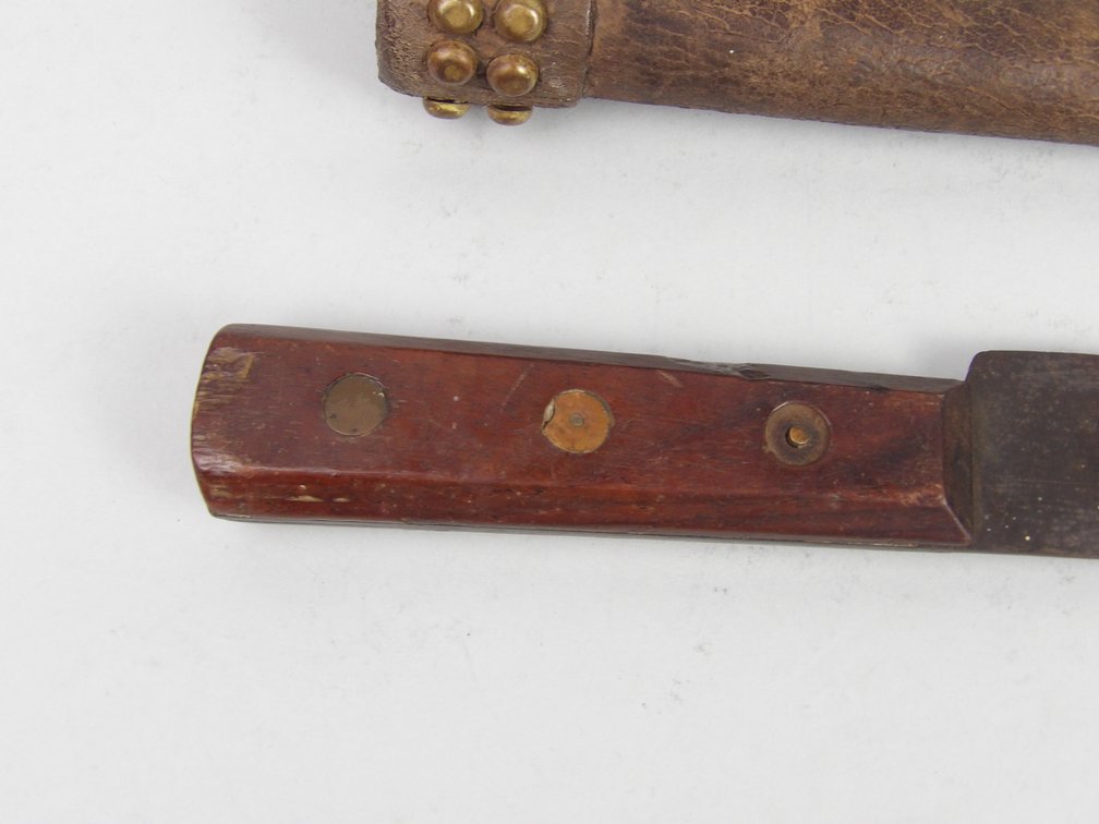 Attributed Blackfoot / Northern Plains Trade Knife with Brass Tacked Leather Sheath