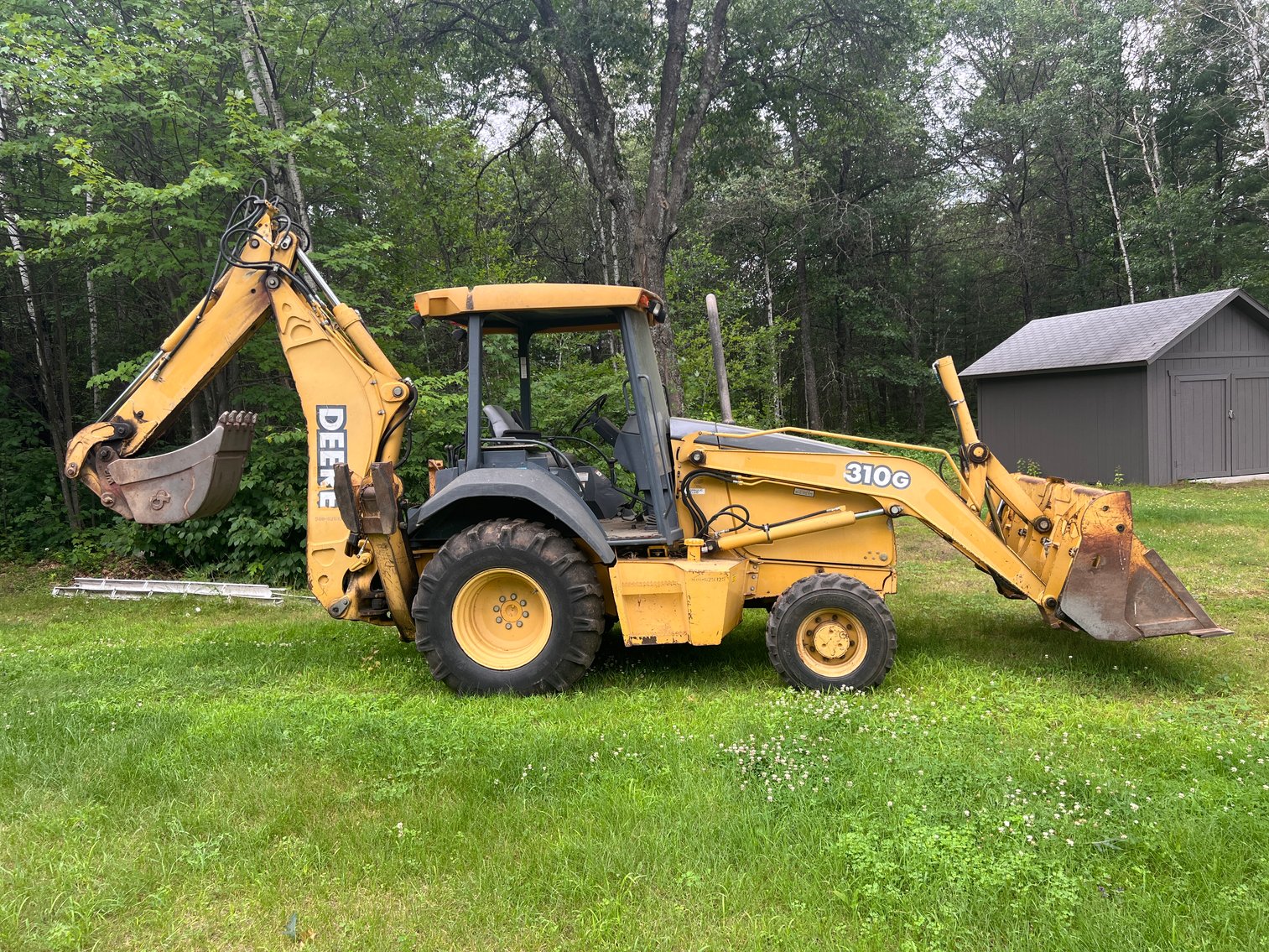 Image for Tomahawk, WI ** JD Backhoe, Zero Turn Mower, Tools, Guns, Trailer, Sporting Goods