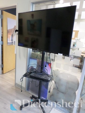 Image for TLC ROKU WIDE SCREEN FLAT PANEL TELEVISION ON STAND