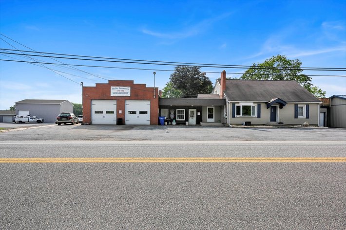 Image for Online Real Estate Auction - Cape Cod Style House with Auto Body Garage on 2+ Acres