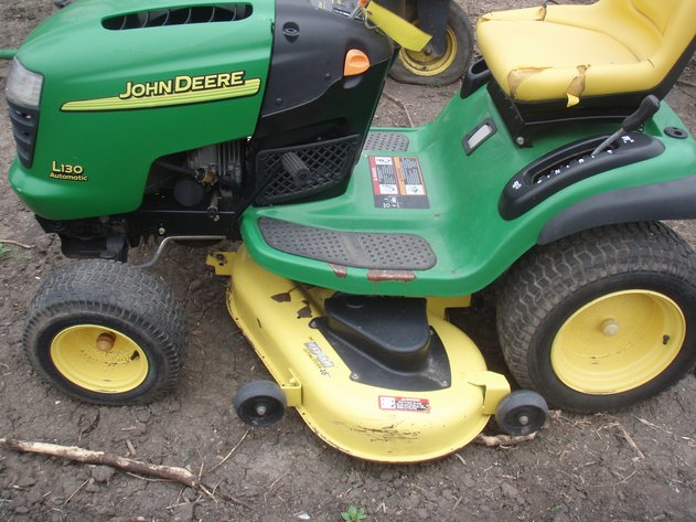 Image for John Deere L130 mower for parts or repair.