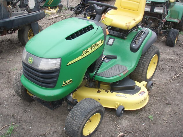 Image for John Deere L130 mower for parts or repair.