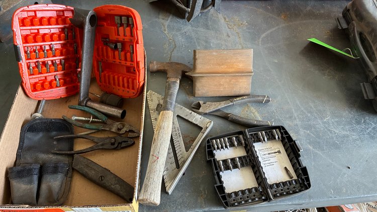 Image for Hammer, speed square, pliers, wire cutter, cement tool