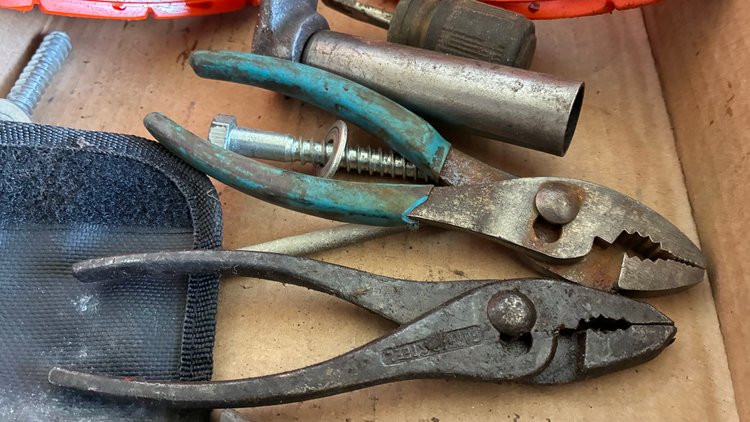 Image for Hammer, speed square, pliers, wire cutter, cement tool